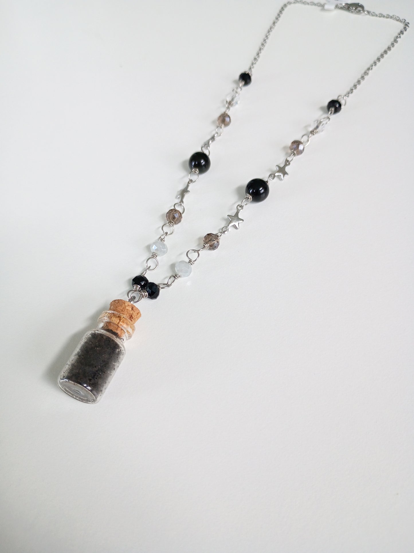 Enchanted bottle (obsidiana)
